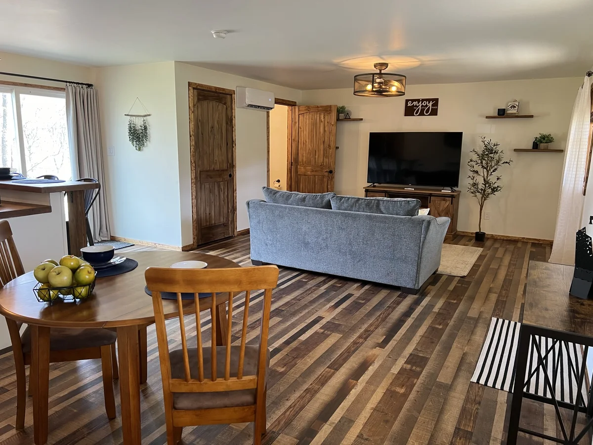 Living and dining area at The Piedmont with sofa and table